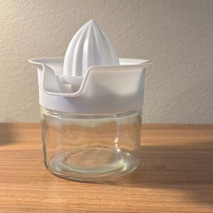 White and Clear Glass Citrus Juicer